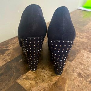 Beautiful black wedge heels with beautiful silver/gold rhinestones. Size 7